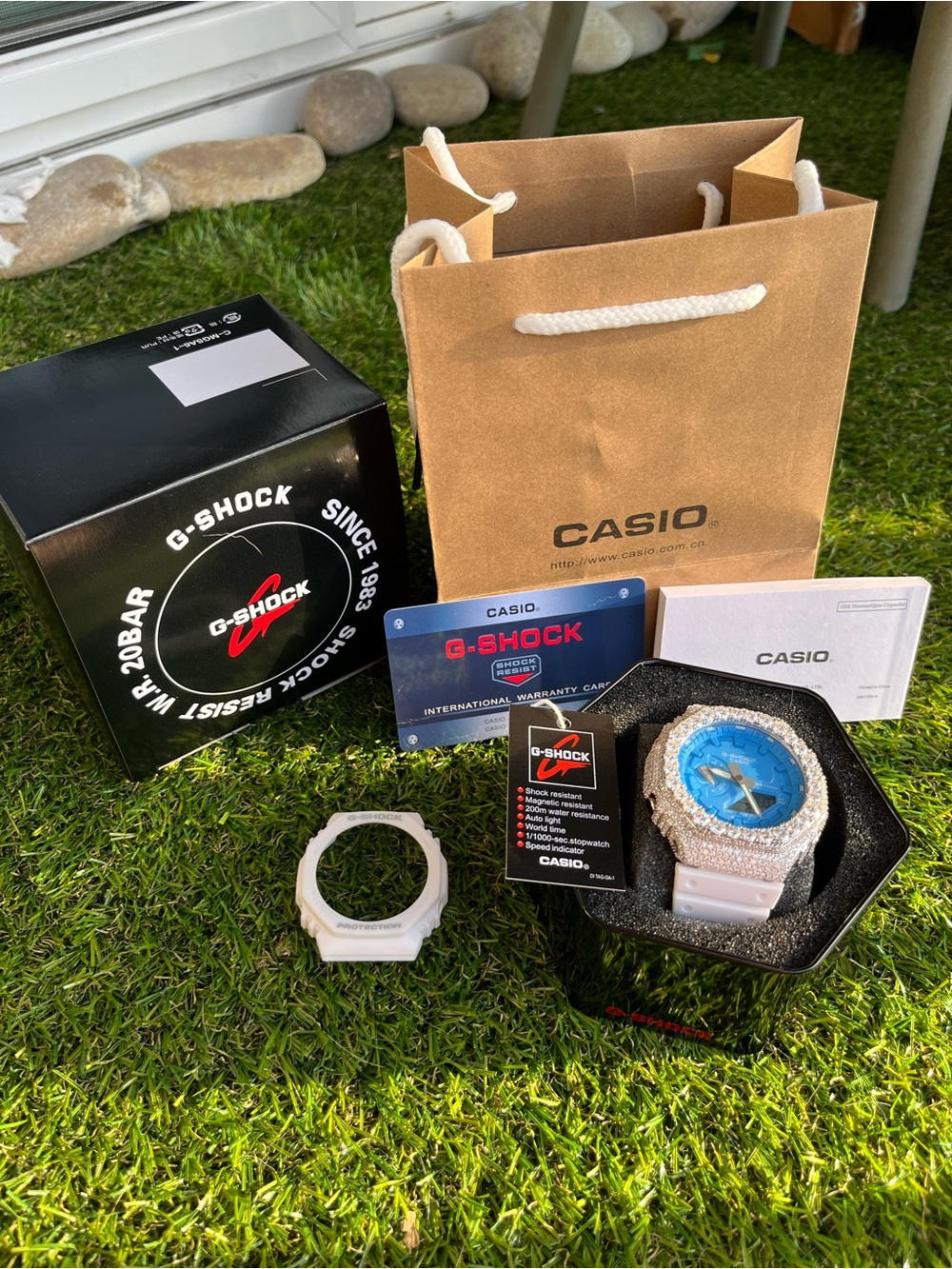Casio G-Shock White Watch with Blue Dial and Silver Crystal Bezel